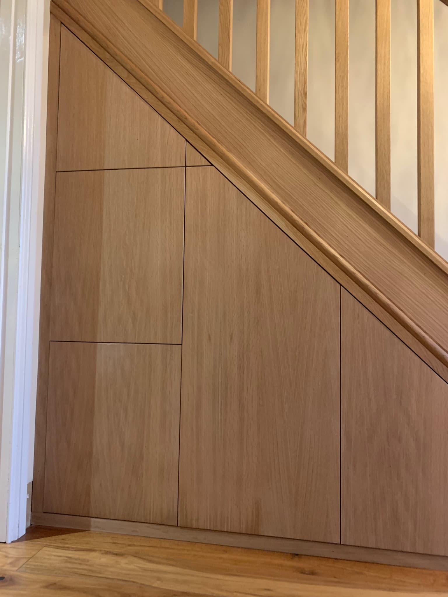 Oak Understairs Storage by KB Joinery & Interiors