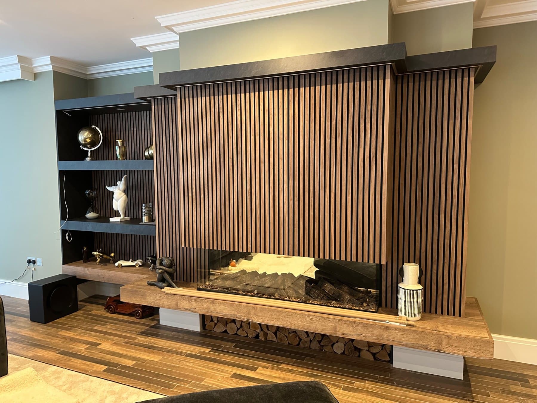 Slatted Fireplace & Media Wall by KB Joinery & Interiors